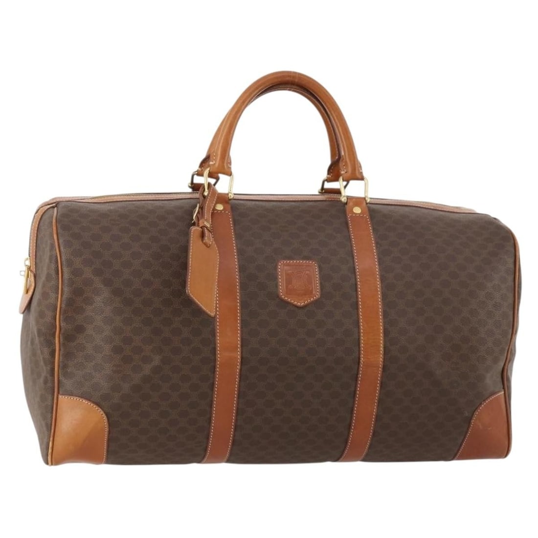 Celine Macadam Canvas and PVC Boston Bag Brown Gold with Name Tag: Celine Macadam Canvas and PVC Boston Bag Brown Gold with Name Tag This CELINE Macadam Canvas Boston Bag features a brown and gold color scheme with PVC leather and Macadam canvas materials. Designed f
