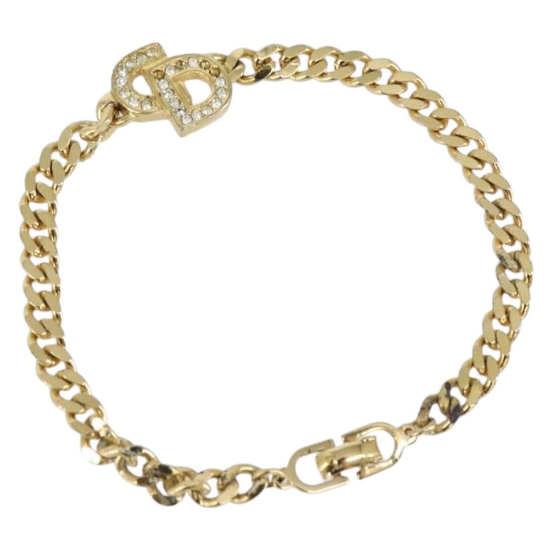 Christian Dior Gold Metal Bracelet Auth AM9559: Christian Dior Gold Metal Bracelet Auth AM9559 This Christian Dior bracelet is a stylish metal accessory in a luxurious gold tone. With a total length of approximately 19 cm (7.5 inches), this bracele