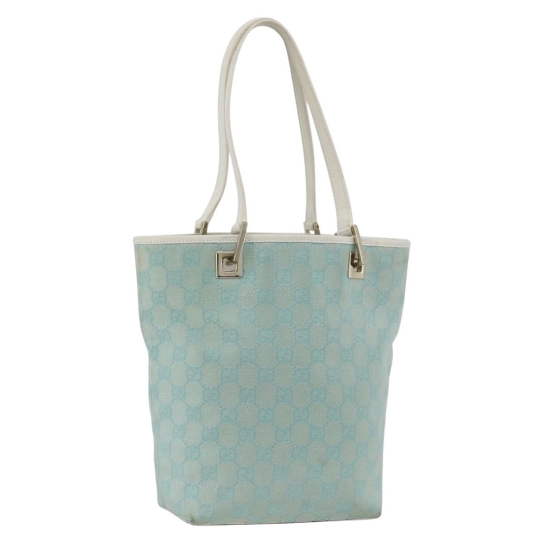 Gucci GG Canvas Gold and Light Blue 002 1099 Women's Tote Handbag: Gucci GG Canvas Gold and Light Blue 002 1099 Women's Tote Handbag This GUCCI GG Canvas Tote Bag features a gold and light blue exterior, crafted from signature GG canvas. The bag offers a spacious int