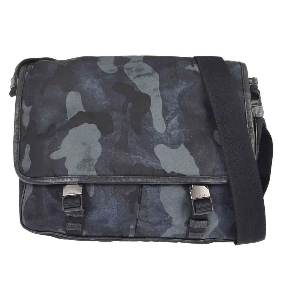 Prada Medium Camouflage Nylon and Leather Shoulder Bag in Black: Prada Medium Camouflage Nylon and Leather Shoulder Bag in Black This Prada shoulder bag features a black camouflage design crafted from a combination of leather and nylon. Designed in a medium size, i