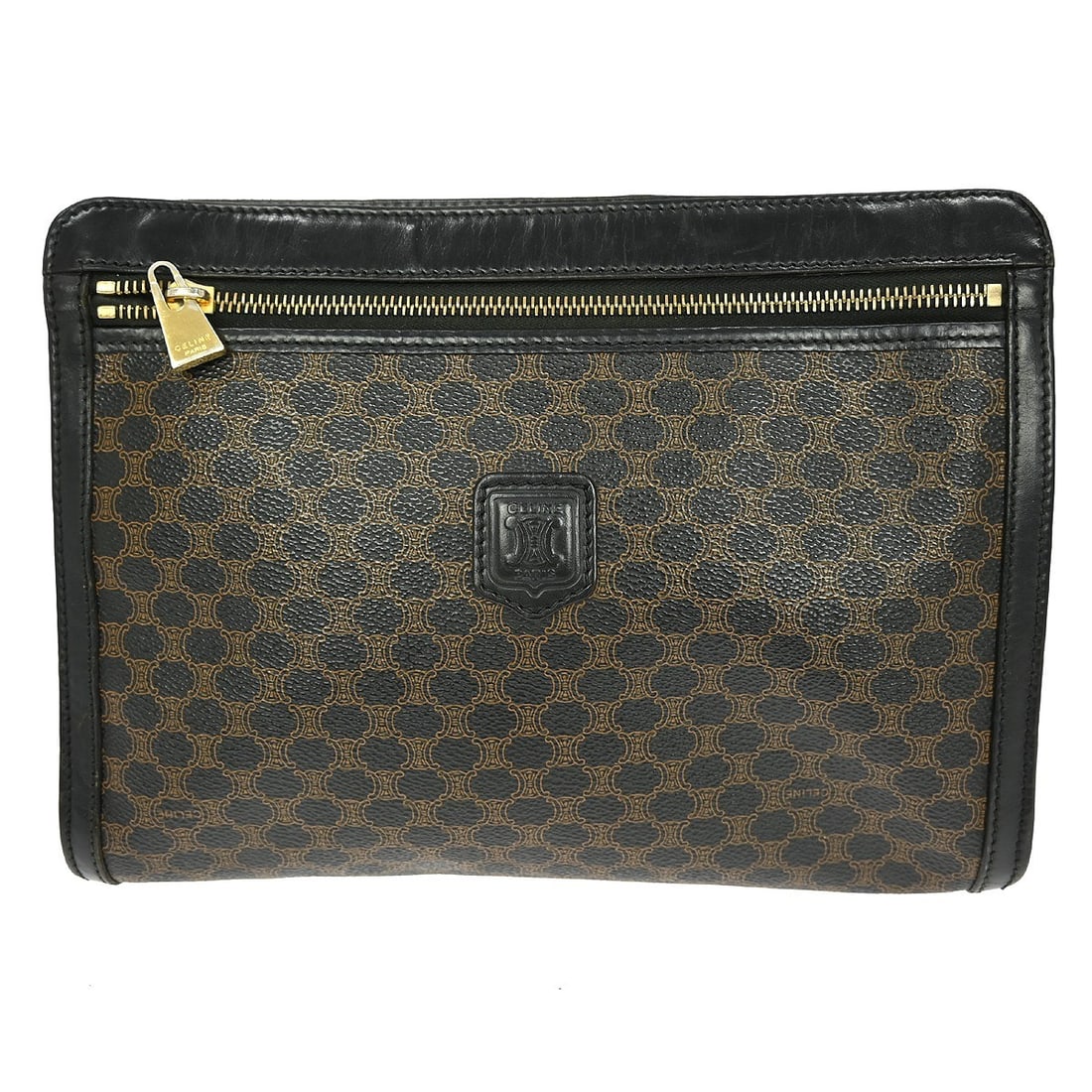 Celine Macadam Small Brown PVC Leather Clutch Bag with Zipper Closure: Celine Macadam Small Brown PVC Leather Clutch Bag with Zipper Closure This CELINE Macadam clutch bag features a brown PVC leather exterior with the signature Macadam pattern and a leather-lined interi