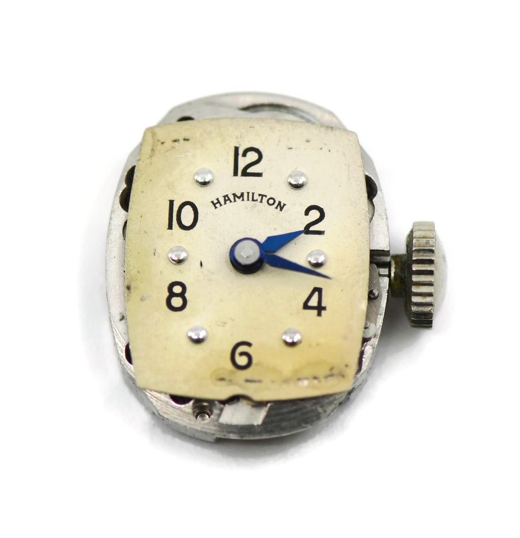 Hamilton 751 Swiss Watch Movement 16x13 mm Authentic Replacement Part: Hamilton 751 Swiss Watch Movement 16x13 mm Authentic Replacement Part This is a pre-owned Hamilton Cal 751 watch movement, made in Switzerland. The movement measures 16 x 13 mm and is 100% authentic. 