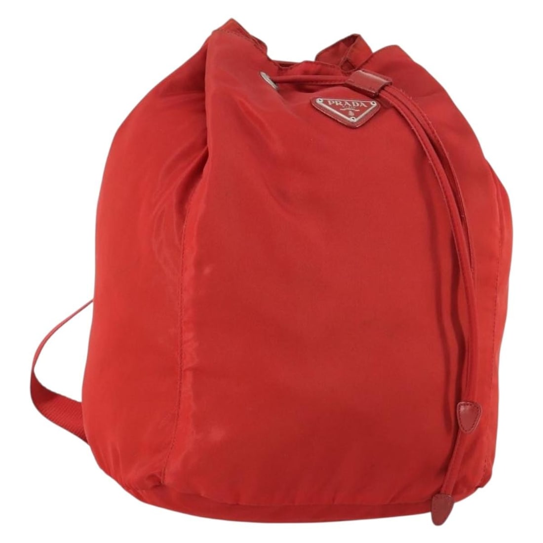 Red Nylon Prada Backpack with Silver Accents Made in Italy: Red Nylon Prada Backpack with Silver Accents Made in Italy This PRADA backpack features a red and silver nylon exterior with silver-tone metal fittings. Made in Italy, it is designed with practical di