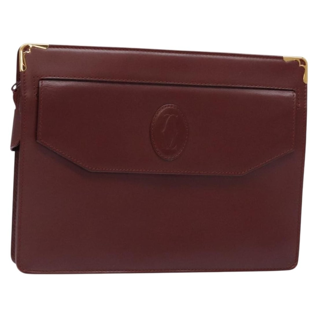 CARTIER Must Line Bordeaux Leather Clutch Bag Gold Accents: CARTIER Must Line Bordeaux Leather Clutch Bag Gold Accents Discover the elegance of the CARTIER Must Line Clutch Bag crafted in luxurious bordeaux leather with gold accents. This timeless accessory fe