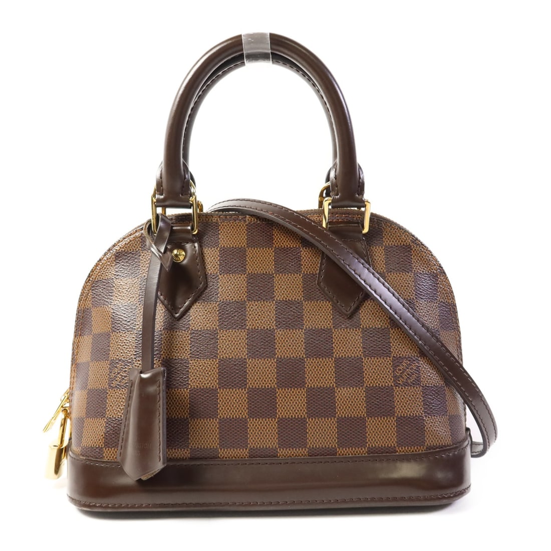 LOUIS VUITTON Alma BB 2 Way Shoulder Bag Damier Ebene Brown: LOUIS VUITTON Alma BB 2 Way Shoulder Bag Damier Ebene Brown This LOUIS VUITTON Alma BB 2 Way Shoulder Handbag is a stylish and versatile accessory. Crafted from durable PVC coated canvas, it features 