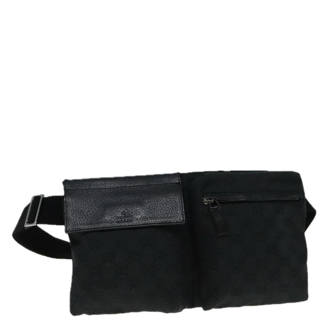 Black GG Canvas Gucci Waist Bag for Women: Black GG Canvas Gucci Waist Bag for Women This GUCCI GG Canvas waist bag features a classic black canvas exterior with signature GG detailing. Designed for women, it offers a compact and practical sty