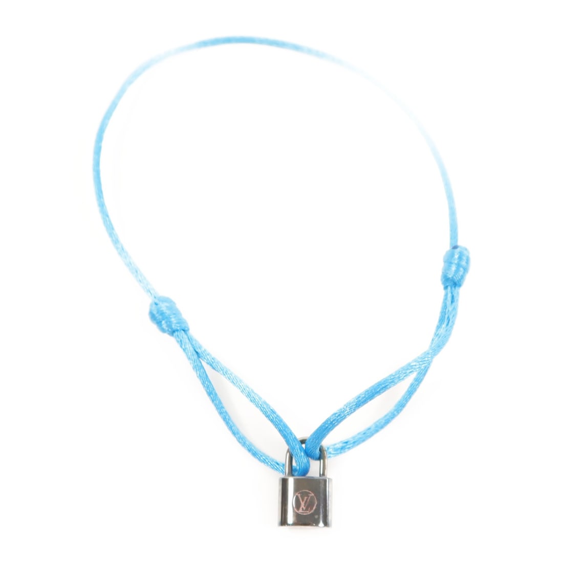 LOUIS VUITTON Lockit Bracelet in 925 Sterling Silver with Blue Finish: LOUIS VUITTON Lockit Bracelet in 925 Sterling Silver with Blue Finish Elevate your accessory collection with the LOUIS VUITTON LV Lockit Bracelet, crafted from high-quality 925 sterling silver with a 