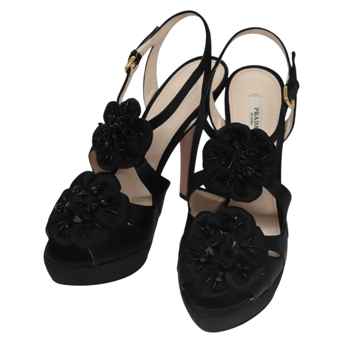 Black Satin Prada Women's High Heel Shoes Size 37.5 with Box and Dust Bag: Black Satin Prada Women's High Heel Shoes Size 37.5 with Box and Dust Bag These PRADA women's high heels feature a sleek black satin upper, offering an elegant look. Made in Italy, the shoes have a he