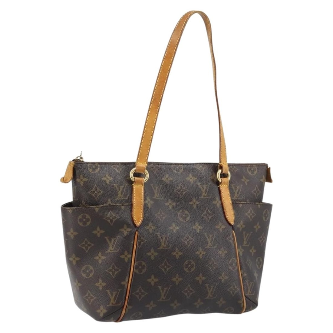 Monogram Canvas Totally MM Tote M56689 by Louis Vuitton: Monogram Canvas Totally MM Tote M56689 by Louis Vuitton This Louis Vuitton Totally MM Tote Bag features the signature monogram canvas exterior and is designed for women. The bag is made in France and 