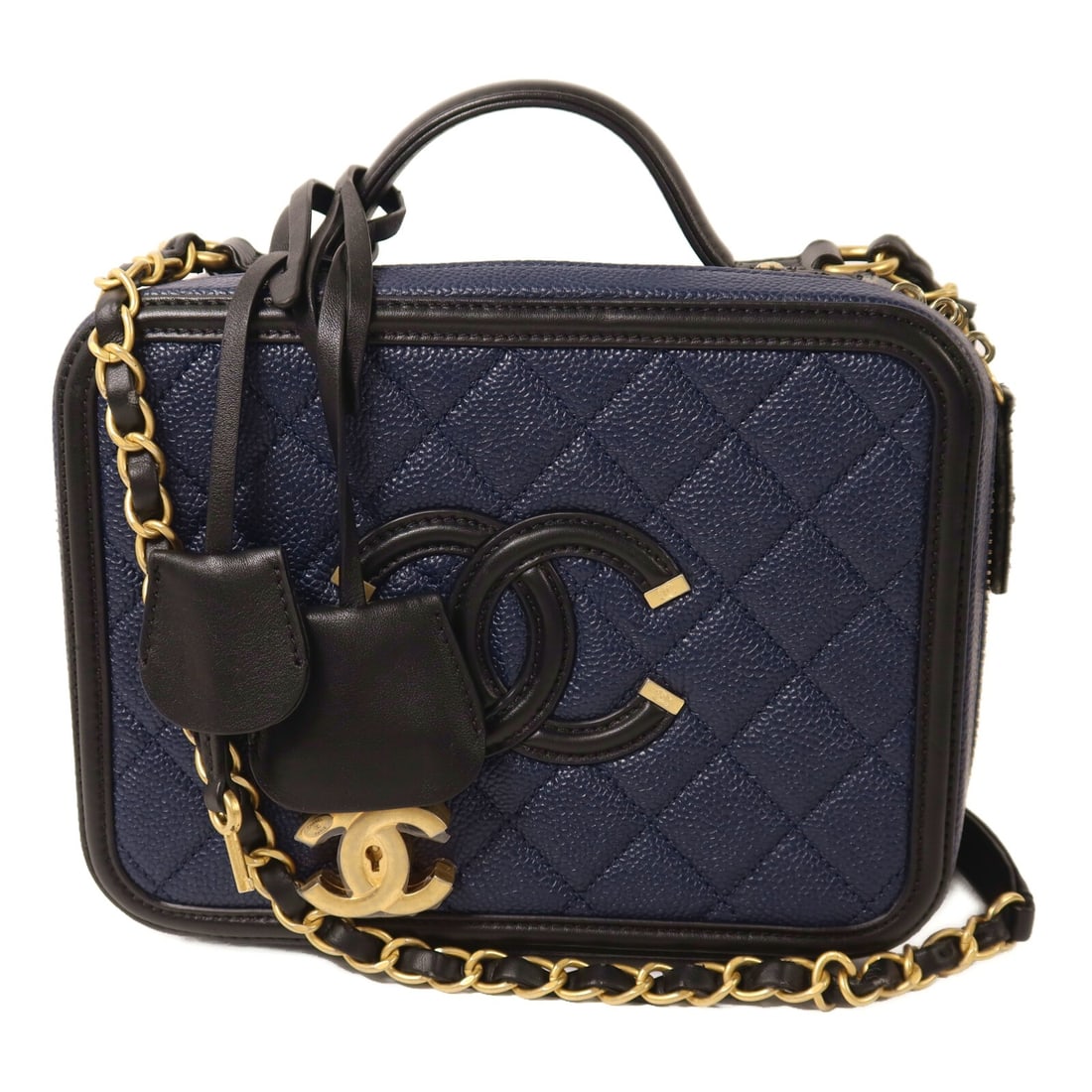 Chanel Navy Calfskin Vanity Shoulder Bag with Gold Tone Chain: Chanel Navy Calfskin Vanity Shoulder Bag with Gold Tone Chain This CHANEL CC Vanity Case is a two-way shoulder bag crafted from calfskin leather in navy and black. Designed for women, it features a ve