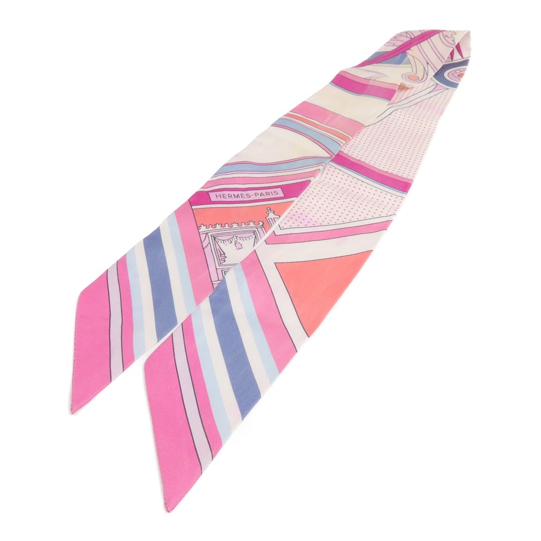 Pink Silk Twilly Scarf by Hermes: Pink Silk Twilly Scarf by Hermes This Hermes Twilly scarf is crafted from silk in a pink hue. Made in France, it features a classic scarf style and is designed for regular size wear. The item shows re