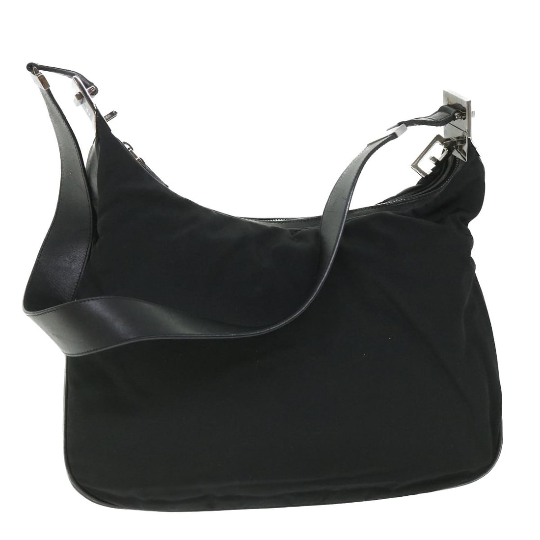Black Canvas and Leather Shoulder Bag by Gucci Italy: Black Canvas and Leather Shoulder Bag by Gucci Italy This is a GUCCI women's shoulder bag crafted from black canvas with leather accents. The bag features a spacious design, suitable for everyday use,