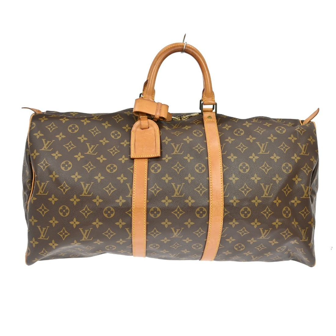 Keepall Travel Bag by Louis Vuitton in Monogram Canvas 55cm: Keepall Travel Bag by Louis Vuitton in Monogram Canvas 55cm This Louis Vuitton Keepall bag features the signature Monogram canvas in brown and is designed for unisex use. Crafted in France, the bag is