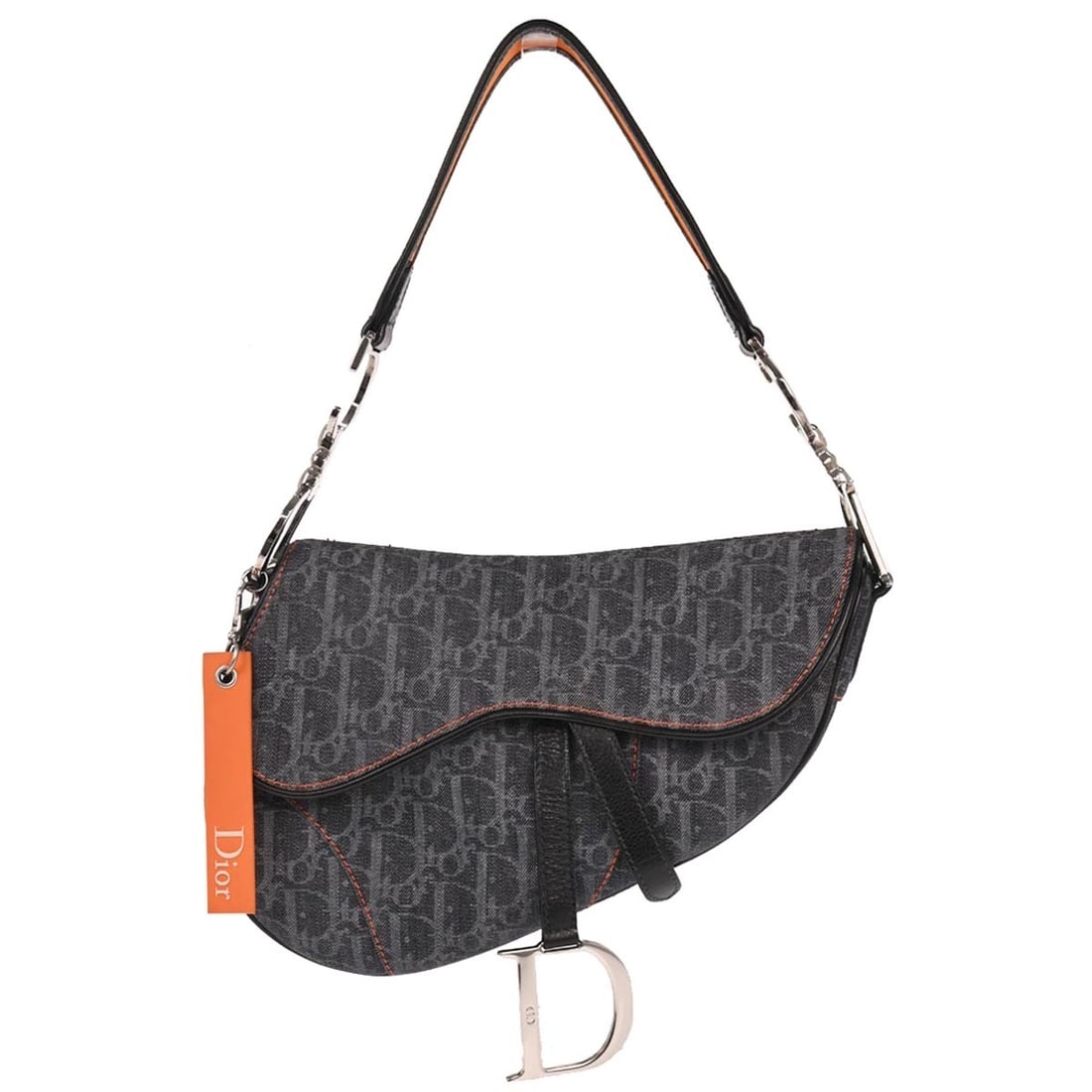 Dior Saddle Navy Canvas and Leather Shoulder Bag 06-RU-1005: Dior Saddle Navy Canvas and Leather Shoulder Bag 06-RU-1005 This Christian Dior Saddle handbag features a navy canvas and leather exterior with a medium-sized silhouette. It is designed with a Velcro 