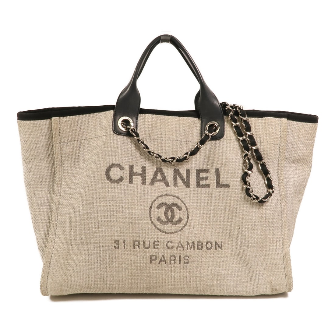 Chanel Deauville White Canvas 2 Way Tote with Chain Shoulder Strap: Chanel Deauville White Canvas 2 Way Tote with Chain Shoulder Strap This CHANEL Deauville Tote is a versatile 2-way chain shoulder bag crafted from white canvas. Designed for women, it features a spaci