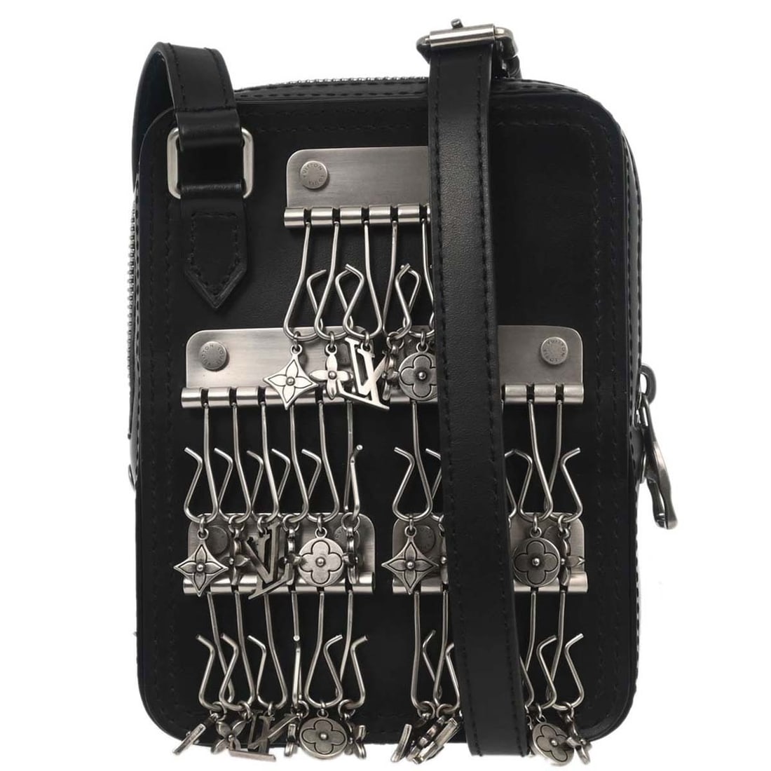 Louis Vuitton Danube Mini Black Leather Crossbody Bag with Logo Accent: Louis Vuitton Danube Mini Black Leather Crossbody Bag with Logo Accent This Louis Vuitton Danube messenger shoulder bag features a black leather exterior with the iconic logo accents. Designed in a mi