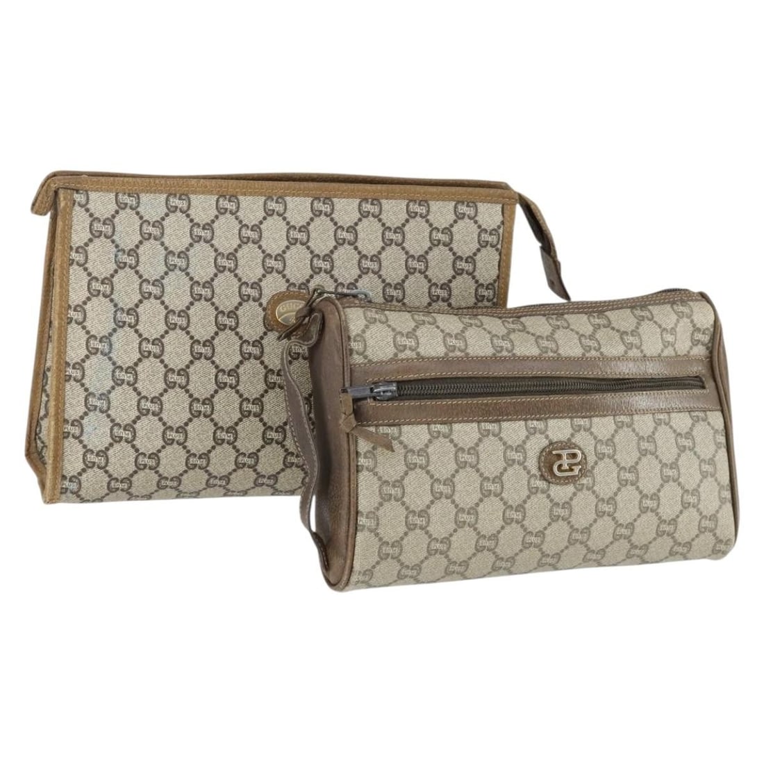 Set of 2 Beige GG Plus Supreme PVC Clutch Bags by Gucci: Set of 2 Beige GG Plus Supreme PVC Clutch Bags by Gucci This is a set of two Gucci GG Plus Supreme clutch bags crafted in beige PVC leather and GG canvas. Made in Italy, these clutches show considerab