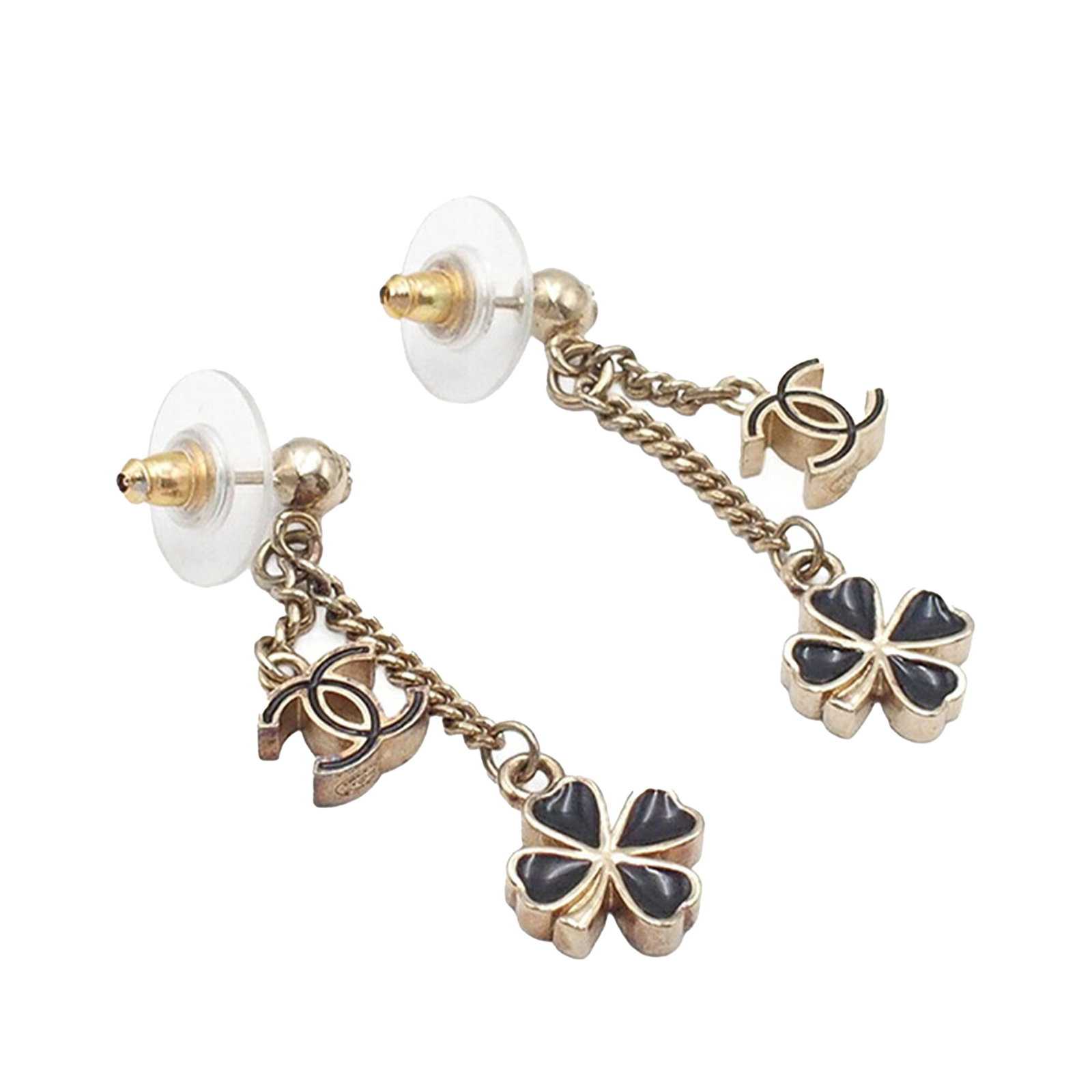 Chanel Clover Resin and Gold Plated Swing Earrings with Push Back Closure: Chanel Clover Resin and Gold Plated Swing Earrings with Push Back Closure These Chanel earrings feature gold-plated metal and resin in a distinctive clover swing design. They are equipped with push ba