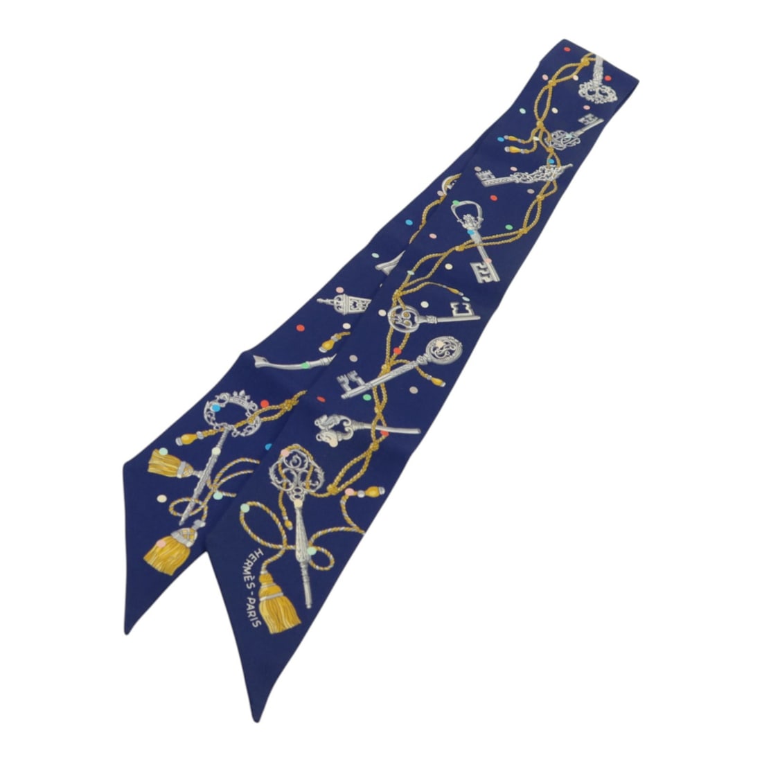 Hermes Silk Twilly Navy and Multicolor Women's Scarf: Hermes Silk Twilly Navy and Multicolor Women's Scarf This HERMES Twilly scarf is crafted from luxurious silk and features a navy, silver, and multicolor design. Made in France, it is designed for wome