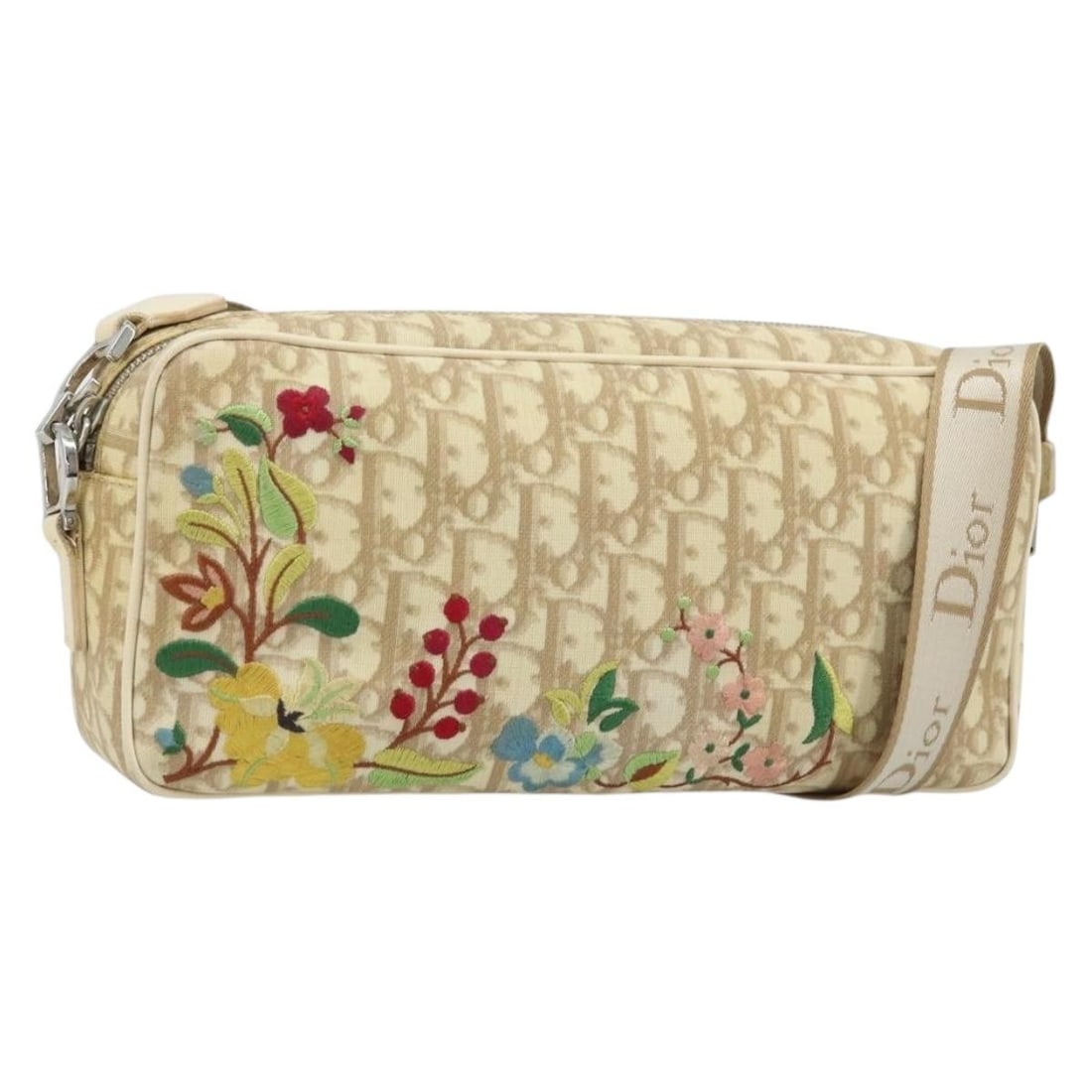 Christian Dior Ivory Trotter Canvas Shoulder Bag with Silver Accents: Christian Dior Ivory Trotter Canvas Shoulder Bag with Silver Accents This Christian Dior shoulder bag features the iconic Trotter canvas in an ivory and silver color scheme. Designed for women, it off