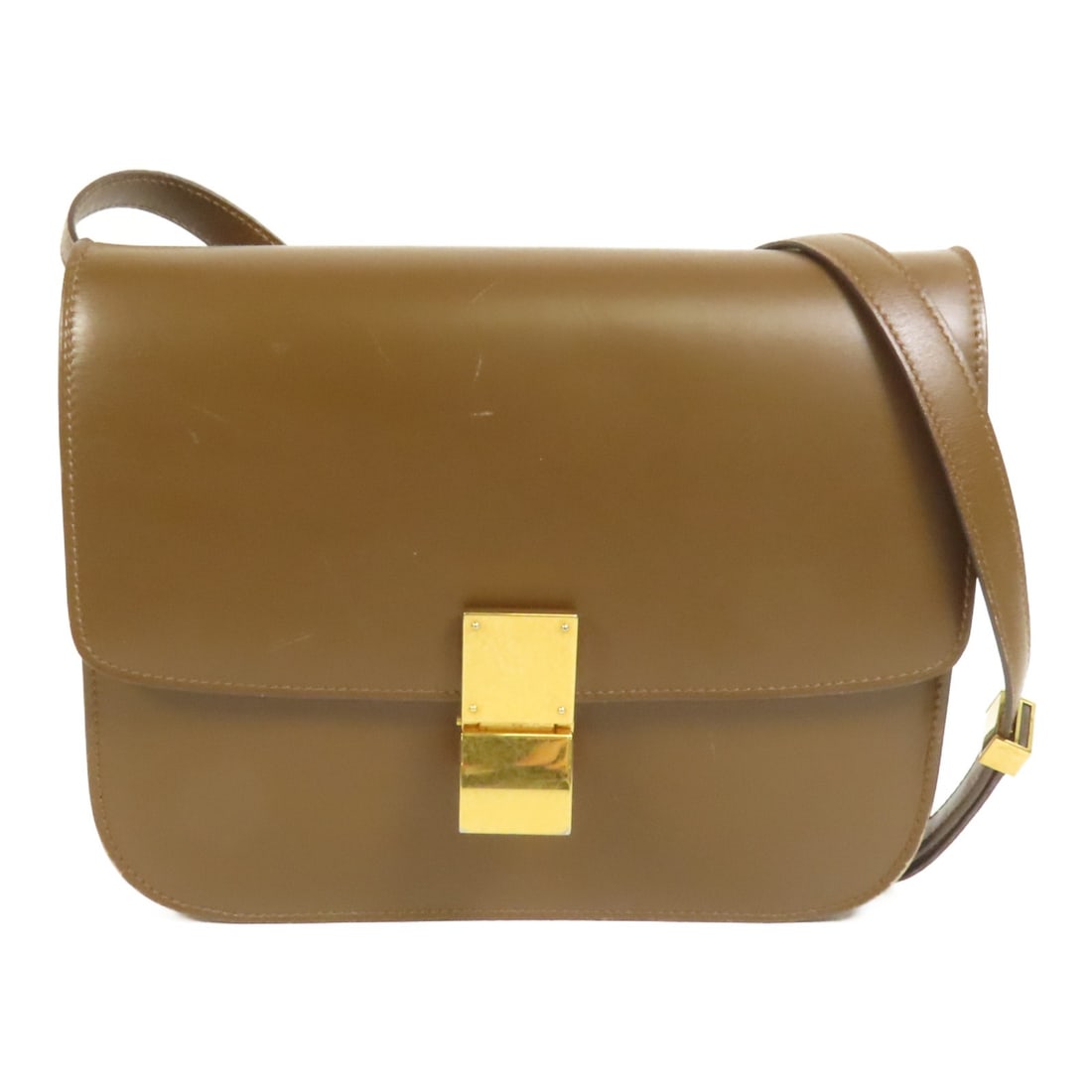 CELINE Classic Box Shoulder Bag Brown Calfskin Leather GHW: CELINE Classic Box Shoulder Bag Brown Calfskin Leather GHW This CELINE Classic Box Shoulder Bag is a chic accessory crafted from luxurious brown calfskin leather. Designed for versatility, it features