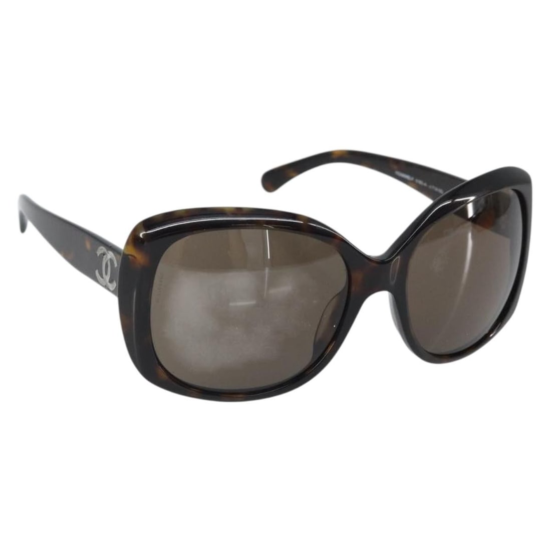 Brown Plastic CHANEL 5918 Sunglasses with Case Italy: Brown Plastic CHANEL 5918 Sunglasses with Case Italy These CHANEL sunglasses feature a brown plastic frame and come with a matching sunglass case. Made in Italy, they are designed in a classic style a