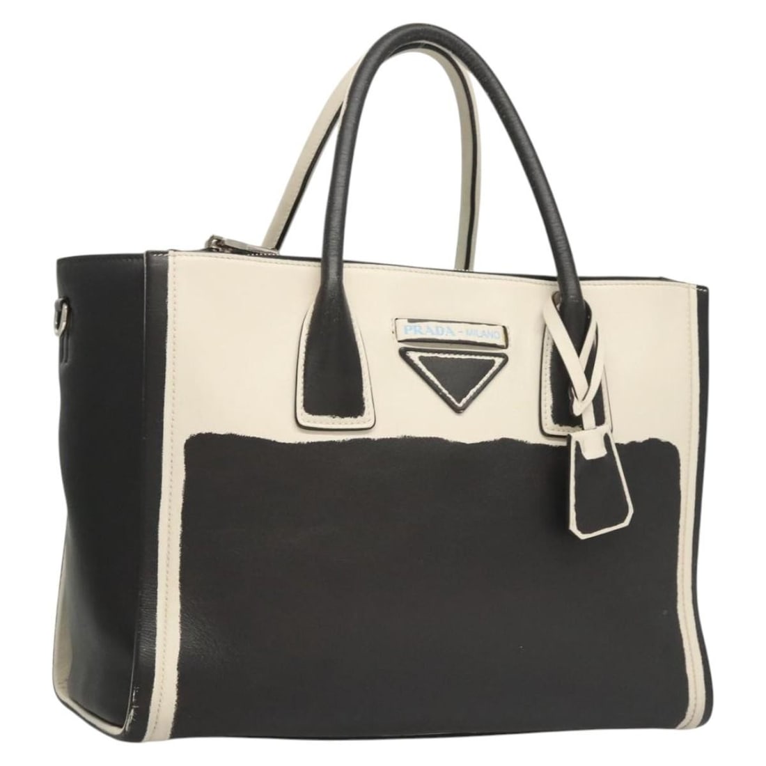 Authentic PRADA Black White Leather Hand Bag Made in Italy: Authentic PRADA Black White Leather Hand Bag Made in Italy Introducing a stylish and authentic PRADA Hand Bag, crafted in Italy from premium leather. This eye-catching bag features a chic black and wh