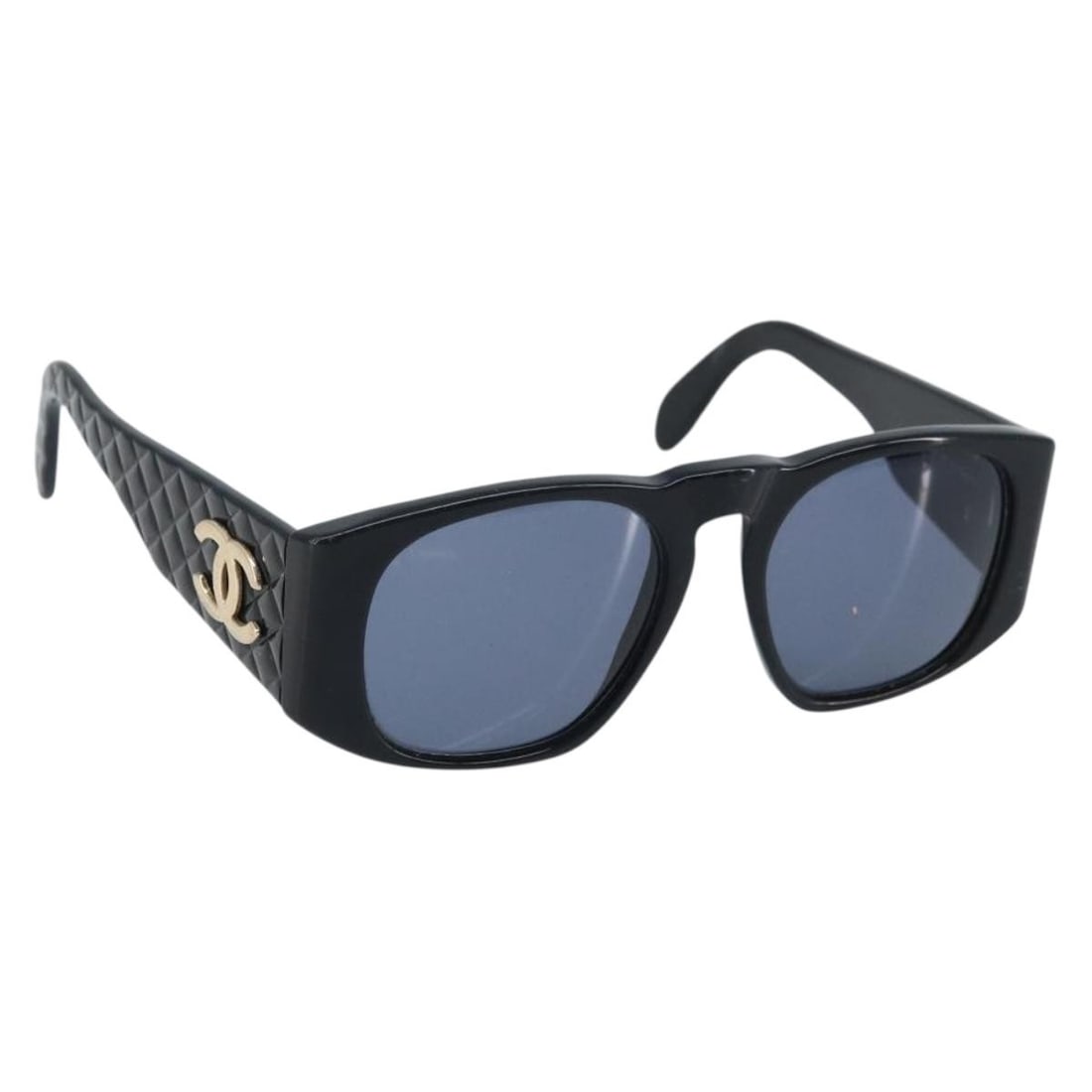 Black Plastic Sunglasses for Women by CHANEL Italy: Black Plastic Sunglasses for Women by CHANEL Italy These CHANEL sunglasses feature a classic black plastic frame with the iconic CC logo. Designed for women, they offer a chic and timeless look. The s