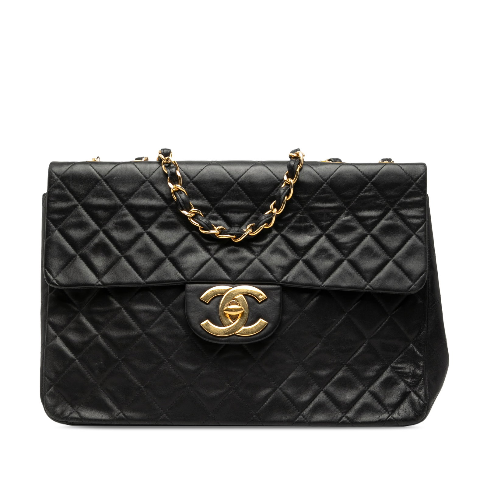 Black Lambskin Maxi Single Flap Bag with Oversized CC Turn Lock: Black Lambskin Maxi Single Flap Bag with Oversized CC Turn Lock This Chanel Maxi XL Classic Single Flap bag is crafted from black lambskin leather and features leather-woven chain straps, an oversized