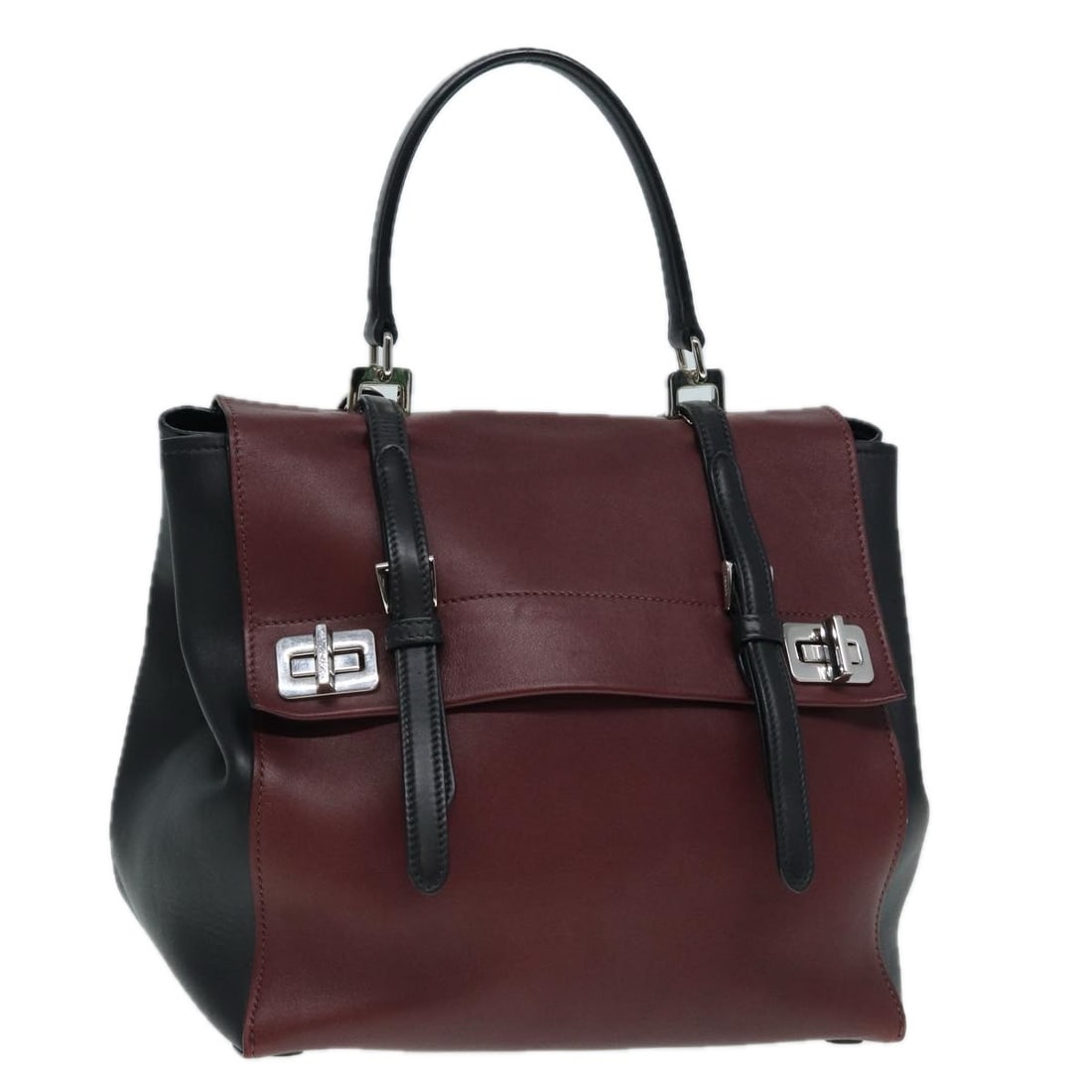 Wine Red Leather PRADA Handbag with Silver Tone Hardware and Guarantee Card: Wine Red Leather PRADA Handbag with Silver Tone Hardware and Guarantee Card This PRADA handbag is crafted from wine red leather with silver-tone accents. Designed for women, it features dual top handl