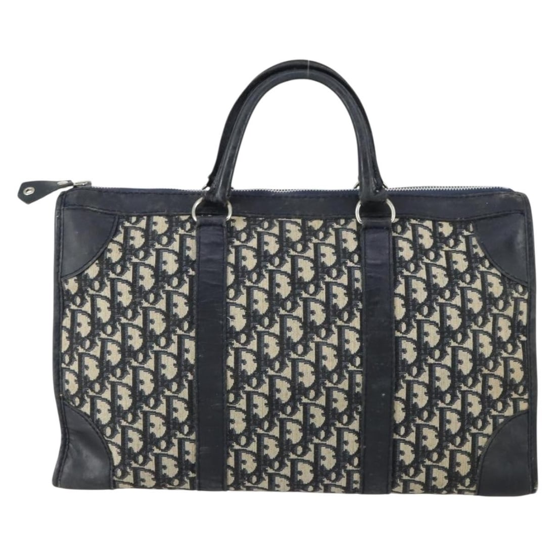Navy Canvas Boston Bag by Christian Dior Vintage Trotter 40cm: Navy Canvas Boston Bag by Christian Dior Vintage Trotter 40cm This vintage Christian Dior Trotter Boston bag features a navy canvas exterior with leather and metal fittings. Designed for women, it mea