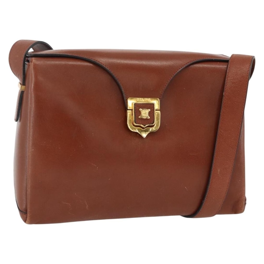 Celine Brown Leather Shoulder Bag Gold Accents Italian Made: Celine Brown Leather Shoulder Bag Gold Accents Italian Made This Celine shoulder bag is crafted from brown leather with gold accents, designed specifically for women. Made in Italy, the bag features a