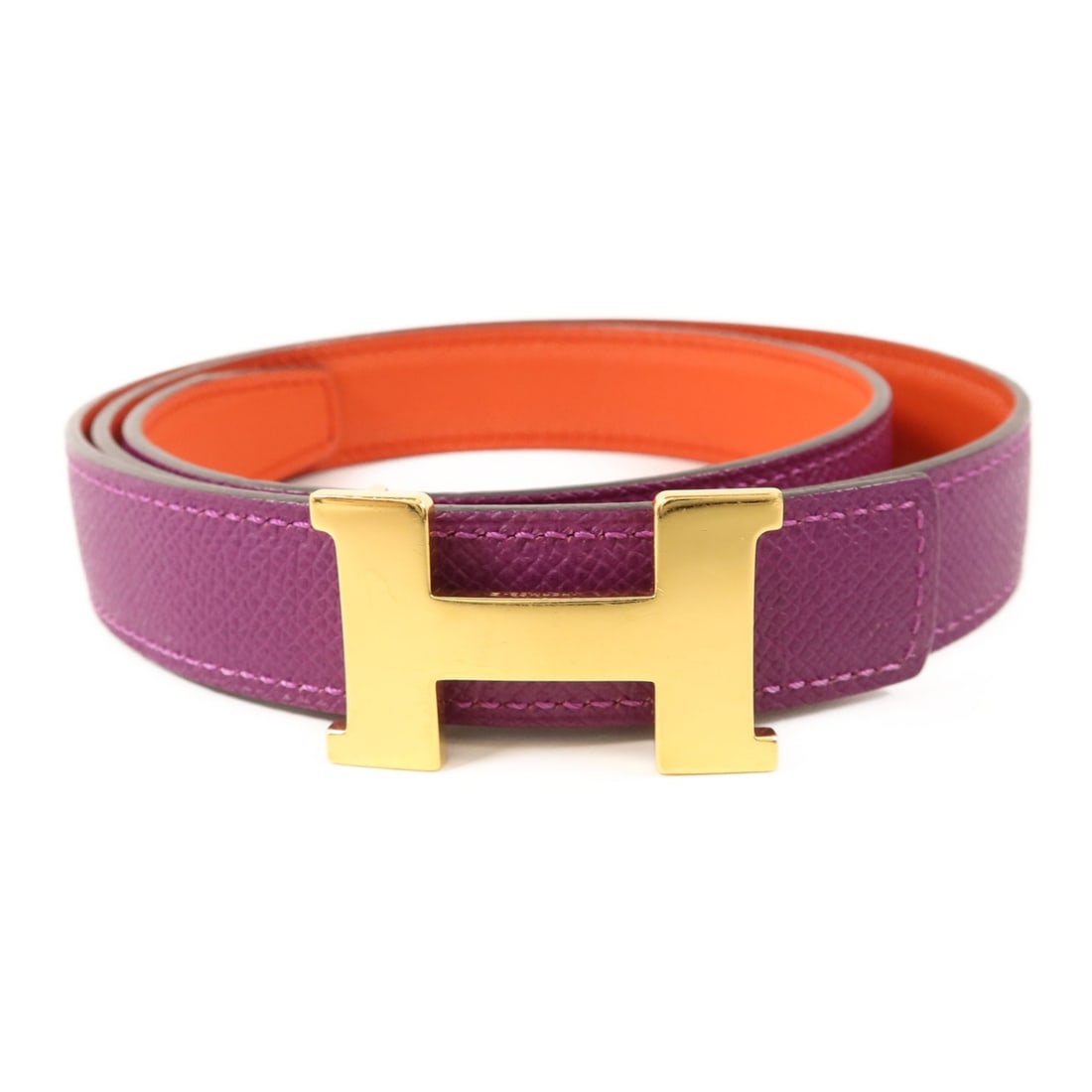 Hermes Epsom Leather Belt with Gold Hardware in Anemone Capucine: Hermes Epsom Leather Belt with Gold Hardware in Anemone Capucine This women's belt by Hermes is crafted from Epsom calfskin leather in a purple hue. The belt features gold-tone hardware and is sized a