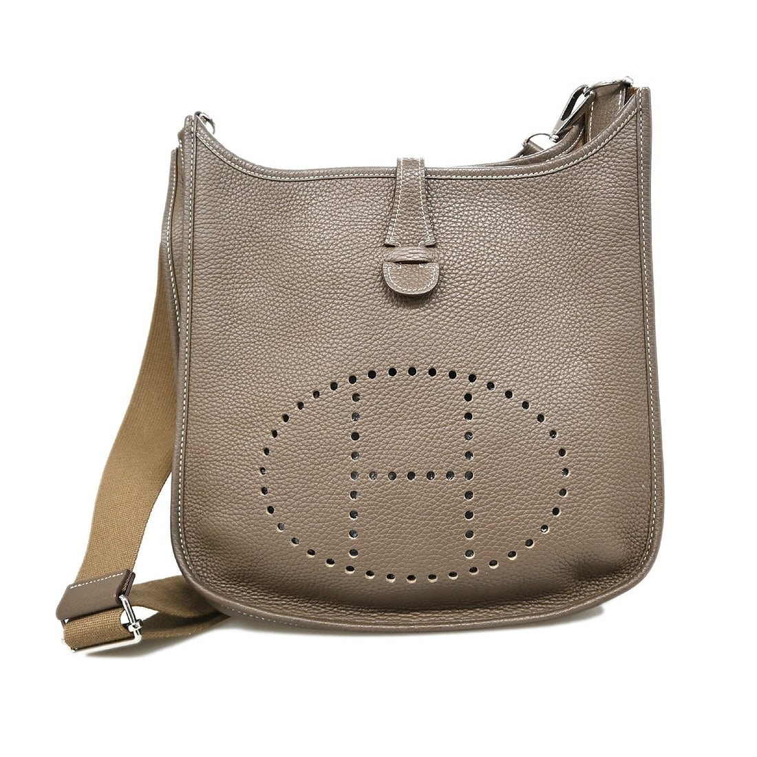 Etoupe Clemence Leather Evelyne III PM Shoulder Bag with Detachable Strap: Etoupe Clemence Leather Evelyne III PM Shoulder Bag with Detachable Strap This Hermes Evelyne III PM shoulder bag is crafted from Etoupe Taurillon Clemence leather and features a snap closure and a de