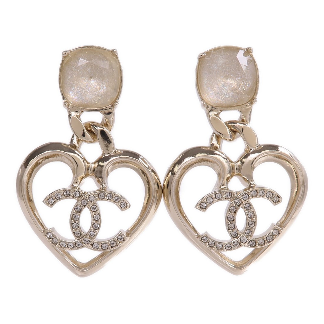 Gold Tone Pierced Earrings with CC Logo by CHANEL: Gold Tone Pierced Earrings with CC Logo by CHANEL These CHANEL CC earrings are designed for women and feature a gold color metal finish. The earrings are pierced style and do not contain any stones. M