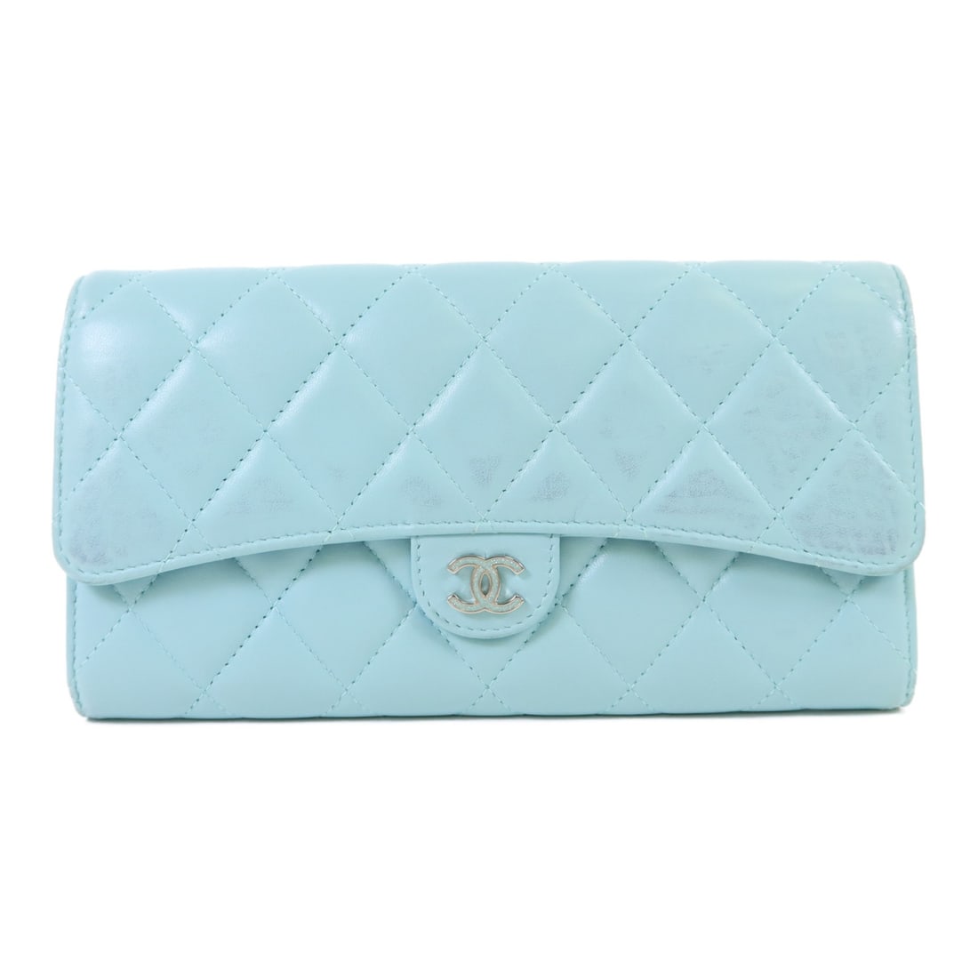 Blue Lambskin Bifold Wallet by Chanel CC Silver Hardware: Blue Lambskin Bifold Wallet by Chanel CC Silver Hardware This CHANEL long wallet features a classic bifold design crafted from luxurious blue lambskin leather. Made in France, it showcases a CC logo w