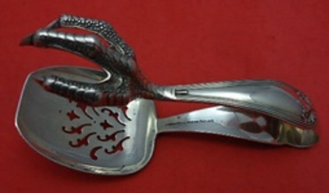 Tiffany & Co Colonial Sterling Silver Ice Tong Chicken Claw Design: Tiffany & Co Colonial Sterling Silver Ice Tong Chicken Claw Design This exquisite ice tong from Tiffany & Co. features a unique design with a realistic chicken claw and a pierced spoon bowl, making it