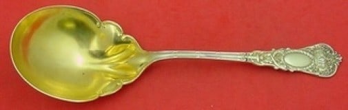 Durgin Empire Sterling Silver Gold Washed Berry Spoon 8 7/8": Durgin Empire Sterling Silver Gold Washed Berry Spoon 8 7/8" This exquisite berry spoon features the timeless Empire pattern by Durgin, crafted from sterling silver with a gold wash finish. Measuring 