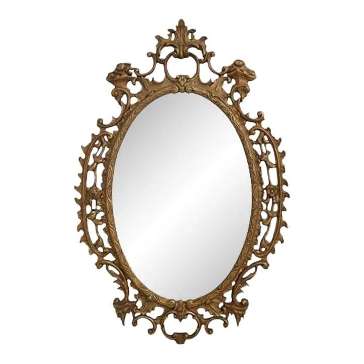 Friedman Brothers French Style Gold Gilt Ornate Frame Mirror 37x53: Friedman Brothers French Style Gold Gilt Ornate Frame Mirror 37x53 This stunning mirror features a gold 9D finish and beveled glass, set within an ornate carved frame that showcases exquisite craftsma