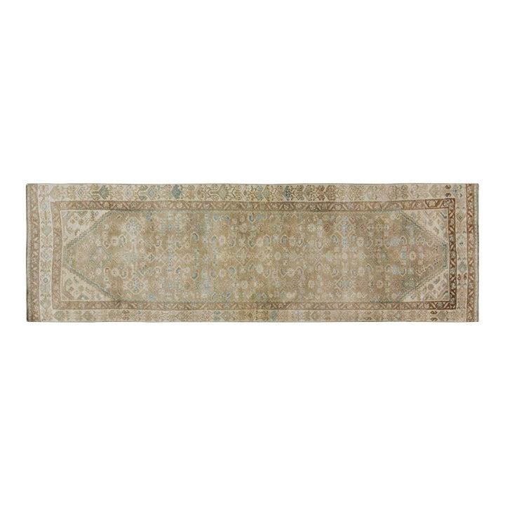 Handmade Wool Runner Rug from Turkey 3'x10' Traditional Craftsmanship: Handmade Wool Runner Rug from Turkey 3'x10' Traditional Craftsmanship This vintage Turkish hand-knotted wool rug showcases timeless craftsmanship through traditional rug-making techniques. Crafted fro