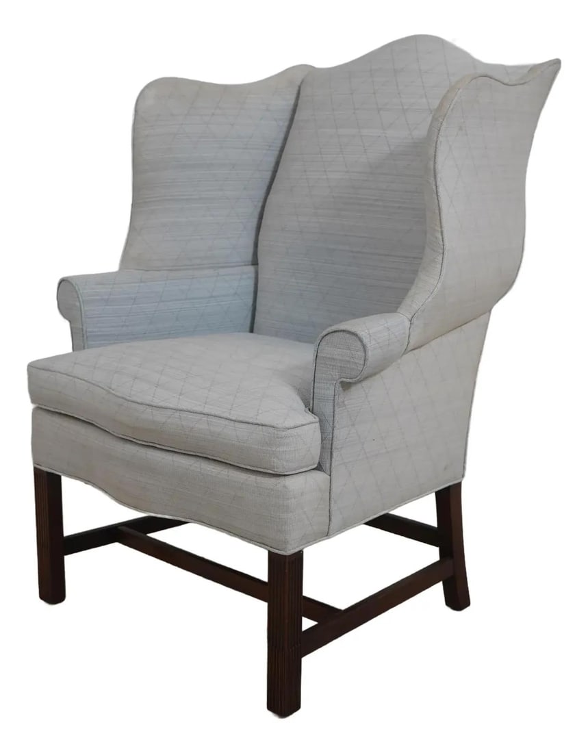 Baker Chippendale Mahogany Wing Back Chair with Down Cushion: Baker Chippendale Mahogany Wing Back Chair with Down Cushion This exquisite Baker Chippendale mahogany wing back easy chair showcases traditional craftsmanship and timeless design. At approximately 25