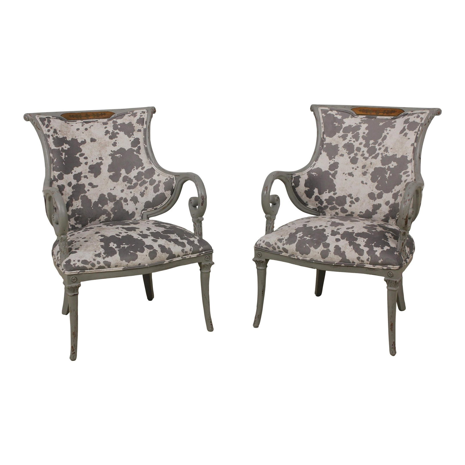 Stylish Pair of Distressed French Design Armchairs with Animal Print Upholstery: Stylish Pair of Distressed French Design Armchairs with Animal Print Upholstery This exquisite pair of modern French design upholstered armchairs features a charming blend of vintage and contemporary 