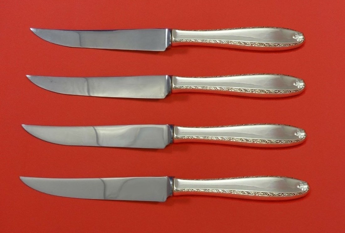 Alvin Southern Charm Sterling Silver Steak Knife Set 4pc Custom 8.5in: Alvin Southern Charm Sterling Silver Steak Knife Set 4pc Custom 8.5in Enhance your dining experience with this exquisite 4-piece steak knife set from the Southern Charm pattern by Alvin. Crafted in st