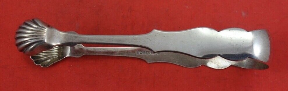 F.S. Shell Coin Silver Ice Tong 6 3/8 Inches Serving Piece: F.S. Shell Coin Silver Ice Tong 6 3/8 Inches Serving Piece This exquisite ice tong, crafted from coin silver by various makers, features a design by F.S. Shell. Measuring 6 3/8 inches in length, this 