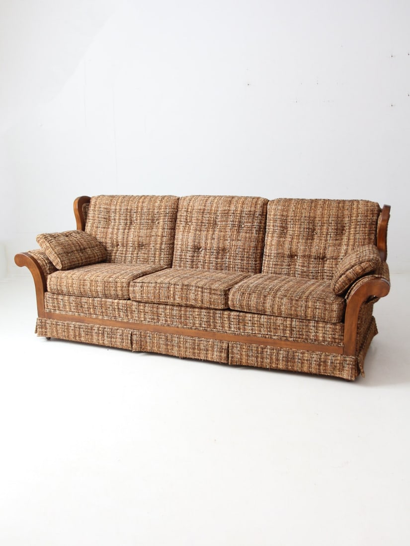 1960s Berne Furniture Mid Century Tweed Sofa with Cushions: 1960s Berne Furniture Mid Century Tweed Sofa with Cushions This mid-century sofa, crafted by Berne Furniture Co. in the 1960s, showcases a stylish plaid tweed upholstery complemented by a warm wood fr