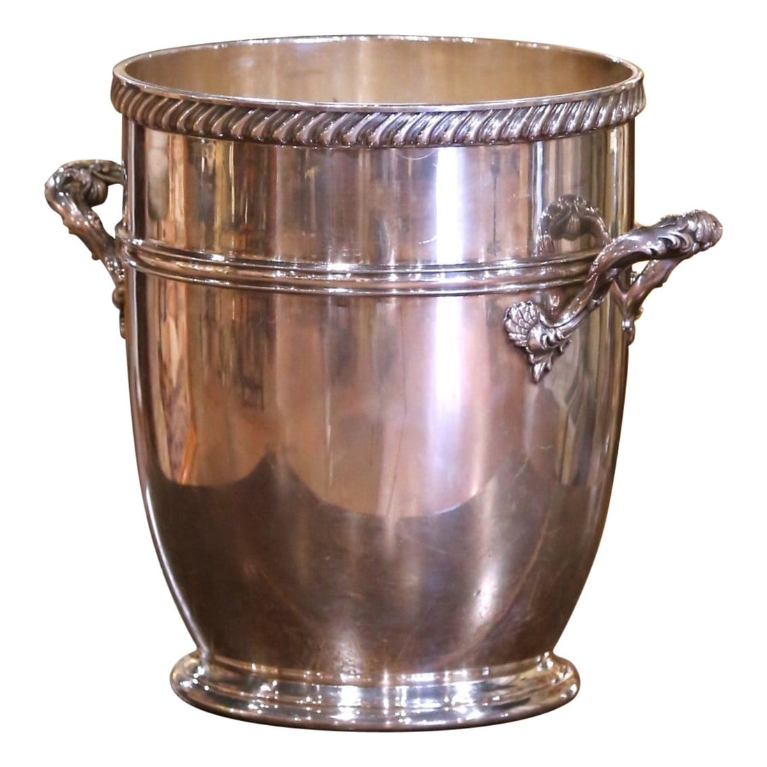 Silver-Plated Bronze Champagne Cooler with Rococo Handles American Circa 1950: Silver-Plated Bronze Champagne Cooler with Rococo Handles American Circa 1950 This mid-century champagne bucket was crafted in the United States around 1950 by Gorham Manufacturing Company. Made with 