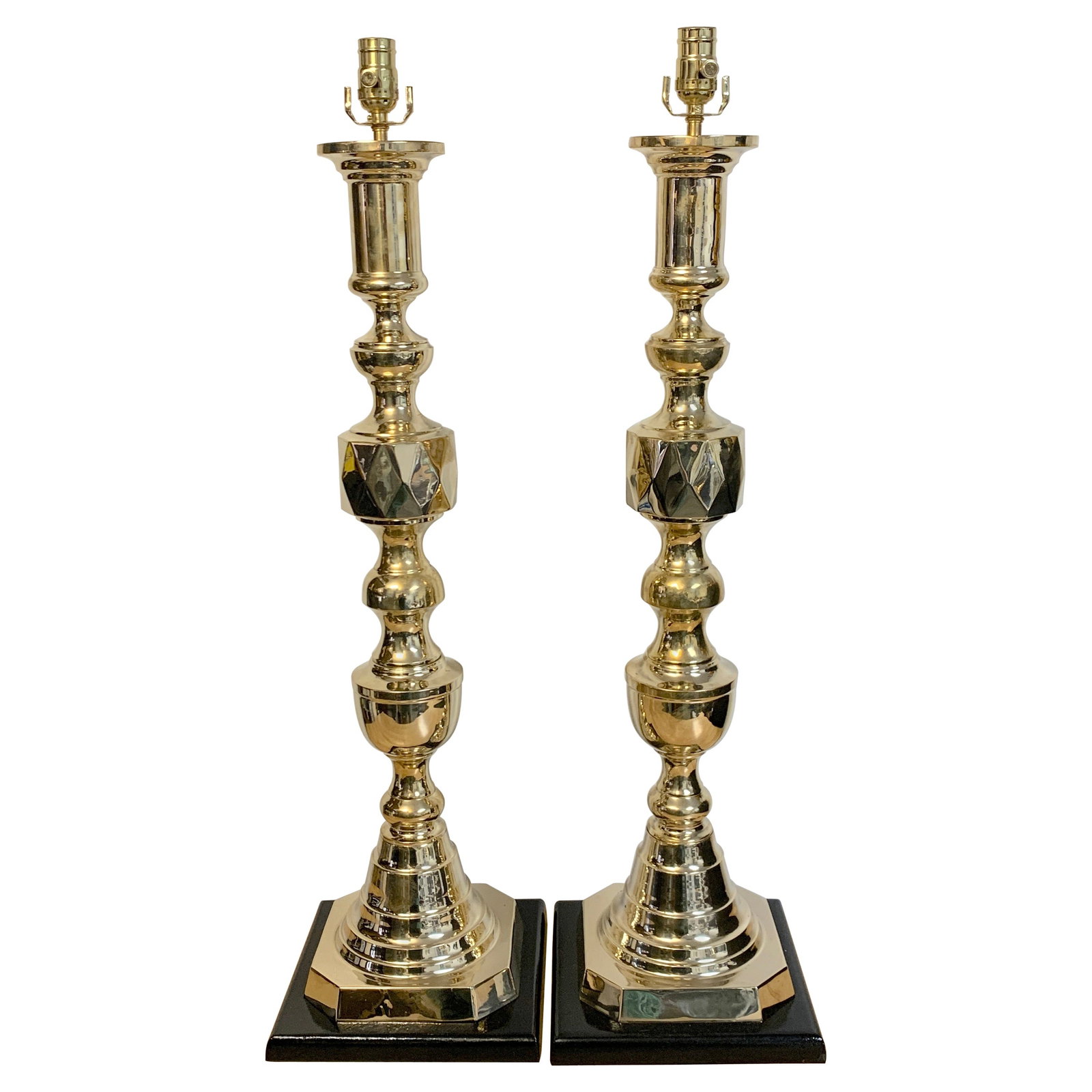 Set of 2 Monumental Brass Candlestick Lamps Ace of Diamonds 36 Inches: Set of 2 Monumental Brass Candlestick Lamps Ace of Diamonds 36 Inches Illuminate your space with this striking pair of monumental 'Ace of Diamonds' brass candlestick lamps, designed in the 1950s. Each