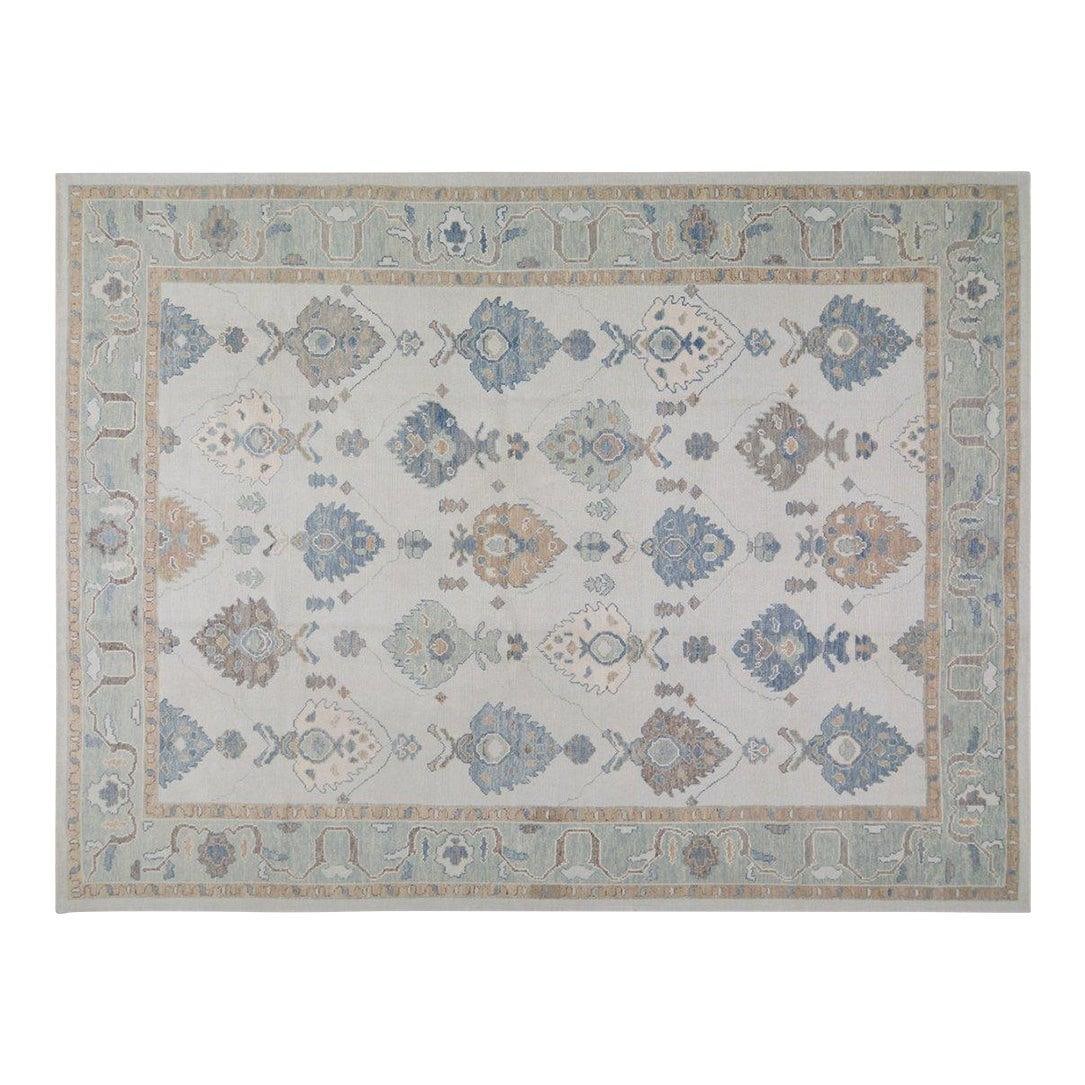 Handmade Wool Oushak Area Rug in 10' x 13'6" Tan: Handmade Wool Oushak Area Rug in 10' x 13'6" Tan This Turkish Oushak rug is hand-knotted from wool using traditional techniques, blending classic artistry with a modern design sensibility. Its durable
