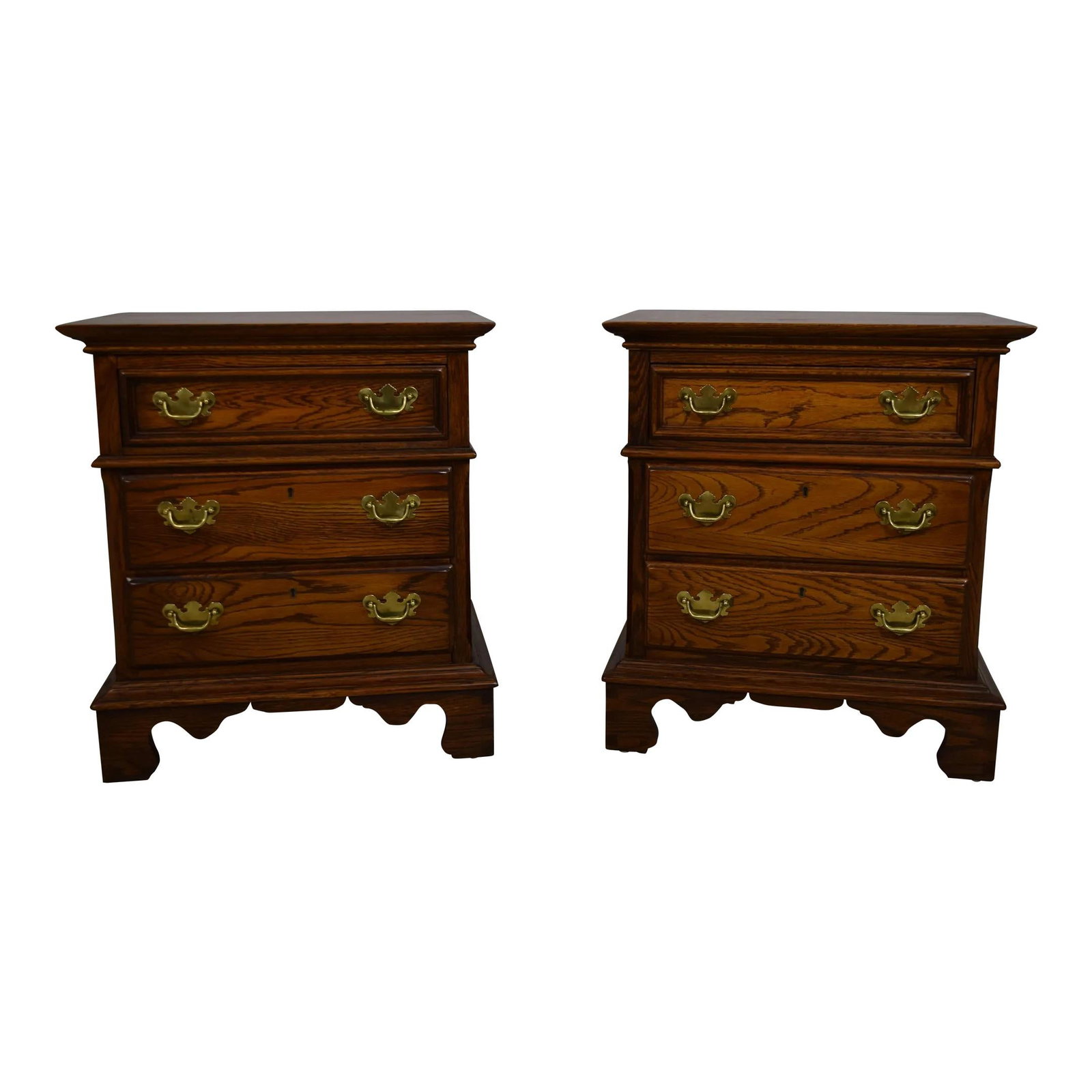 Lexington Chippendale Oak Nightstands Pair with Brass Hardware: Lexington Chippendale Oak Nightstands Pair with Brass Hardware This exquisite pair of Lexington 3 Drawer Chippendale Oak Nightstands showcases timeless craftsmanship and classic design. Constructed ap