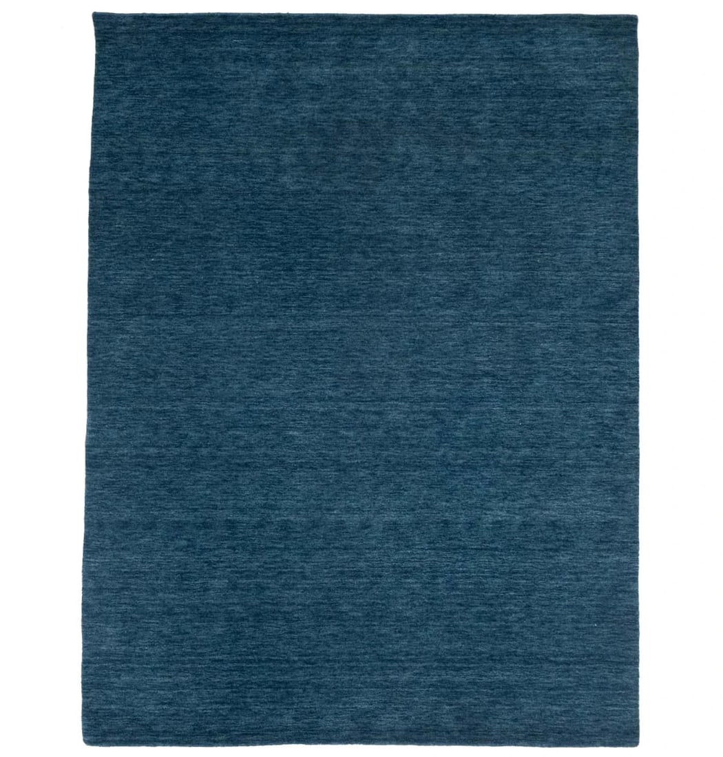 Modern Solid Blue Wool Area Rug Hand-Loomed 5'8 x 7'10: Modern Solid Blue Wool Area Rug Hand-Loomed 5'8 x 7'10 This modern hand-loomed area rug features a solid blue color and a contemporary design. Crafted from wool using a knotted technique, it offers a 